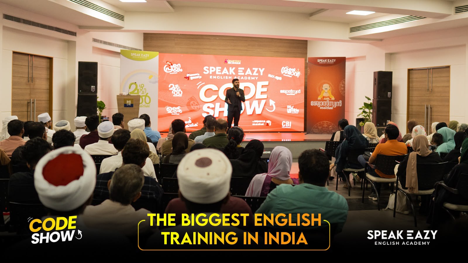 Trainer on stage at a CODE SHOW training session
